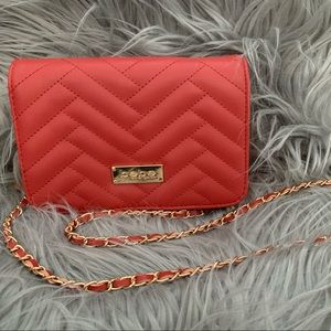 Red Bebe crossbody purse with gold chain strap